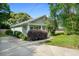 Charming home with a well-manicured lawn, a concrete driveway, and a covered front porch at 1283 Mercer, East Point, GA 30344