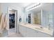 Bright bathroom with double vanity, walk-in closet and separate tub and shower at 1609 Vinery Se Ln, Mableton, GA 30126