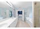 Spacious primary bathroom with double sinks, separate tub, and shower at 1609 Vinery Se Ln, Mableton, GA 30126