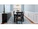 Spacious dining room with hardwood flooring, large window, and traditional furnishings at 1609 Vinery Se Ln, Mableton, GA 30126