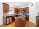 Well-equipped kitchen with stainless steel appliances, granite countertops, and a central island at 1609 Vinery Se Ln, Mableton, GA 30126