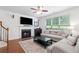 Cozy living room featuring a fireplace and comfortable seating at 1609 Vinery Se Ln, Mableton, GA 30126