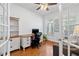 Inviting home office with hardwood floors, French doors, and bright natural light at 1609 Vinery Se Ln, Mableton, GA 30126