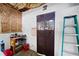 View of unfinished basement with door to another room at 325 Harris Loop, Dallas, GA 30157