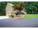 Charming home exterior with well-manicured landscaping and a welcoming front porch at 325 Harris Loop, Dallas, GA 30157