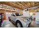 Spacious garage with high ceilings and ample storage space, perfect for car enthusiasts or hobbyists at 325 Harris Loop, Dallas, GA 30157