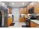 Well-equipped kitchen with stainless steel appliances and granite countertops at 325 Harris Loop, Dallas, GA 30157