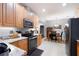 Updated kitchen with modern appliances, granite countertops, and tile flooring at 325 Harris Loop, Dallas, GA 30157