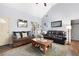 Comfortable living room with high ceilings, plush sofas, and a decorative area rug at 325 Harris Loop, Dallas, GA 30157