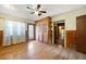 Bright bedroom featuring hardwood floors, closet space, and natural light at 1191 S Burnt Hickory Rd, Douglasville, GA 30134
