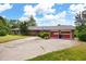 Spacious brick home with an attached two-car garage and large driveway at 1191 S Burnt Hickory Rd, Douglasville, GA 30134