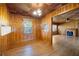 Living space featuring hardwood floors, wood paneling, and open layout at 1191 S Burnt Hickory Rd, Douglasville, GA 30134
