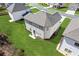 Aerial view of the home featuring a patio and a expansive backyard, perfect for outdoor entertaining at 1784 Treymire Ct, Stone Mountain, GA 30088