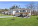 Beautiful two-story home with a covered front porch, a two-car garage, and a pristine lawn at 1784 Treymire Ct, Stone Mountain, GA 30088