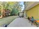Picture of a nice backyard with a patio, green lawn and tall trees providing privacy at 3034 Brookgreen Trl, Lawrenceville, GA 30043