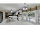 Bright kitchen featuring stainless steel appliances, granite countertops, and large windows overlooking the backyard at 3034 Brookgreen Trl, Lawrenceville, GA 30043