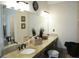 A spacious bathroom with a granite-topped vanity, dual sinks and plenty of counterspace at 11940 Wexford Club Dr, Roswell, GA 30075