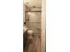 Modern bathroom with a tiled shower and a glass enclosure, offering a clean and contemporary design at 11940 Wexford Club Dr, Roswell, GA 30075