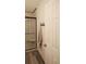 Stylish bathroom with a tiled shower, glass door, and towel rack, providing a functional and elegant space at 11940 Wexford Club Dr, Roswell, GA 30075