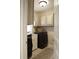 Bright laundry area boasts washer, dryer, cabinetry, and a sink for added convenience at 11940 Wexford Club Dr, Roswell, GA 30075