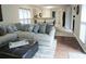 Living room that transitions into the dining room and the kitchen at 11940 Wexford Club Dr, Roswell, GA 30075