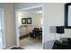 Open-concept living space with tile floors and neutral walls at 11940 Wexford Club Dr, Roswell, GA 30075