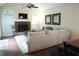 Large brick fireplace featured in a cozy living room with vaulted ceilings at 11940 Wexford Club Dr, Roswell, GA 30075