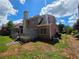 Angle view of home from backyard at 1255 Home Place Dr, Lawrenceville, GA 30043