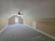 Spacious bonus room with carpet floors and a ceiling fan at 1255 Home Place Dr, Lawrenceville, GA 30043