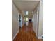 Inviting entryway with hardwood floors leading to the living room with fireplace at 1255 Home Place Dr, Lawrenceville, GA 30043