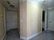 Hallway with neutral paint, carpet, and white doors at 1255 Home Place Dr, Lawrenceville, GA 30043