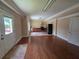 Open kitchen area boasts wood floors and stainless steel appliances at 1255 Home Place Dr, Lawrenceville, GA 30043