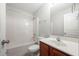 Clean bathroom with tub/shower combination, white fixtures, and vanity at 1871 Stoney Chase Dr, Lawrenceville, GA 30044