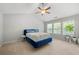 Light and airy bedroom with vaulted ceiling and large windows overlooking the yard at 1871 Stoney Chase Dr, Lawrenceville, GA 30044