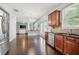 Open-concept kitchen with view into living room, stainless steel appliances, and lots of light at 1871 Stoney Chase Dr, Lawrenceville, GA 30044