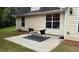 Backyard with patio perfect for outdoor seating and enjoying the lawn at 3066 Gem Creek Rd, Buford, GA 30519