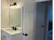 Bathroom with a vanity, granite countertop, modern lighting, and a neutral color scheme at 3066 Gem Creek Rd, Buford, GA 30519