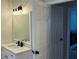 Bathroom featuring a modern vanity and mirror, with access to an adjoining bedroom at 3066 Gem Creek Rd, Buford, GA 30519
