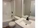 Bathroom featuring a tub and shower combo, a modern vanity, and black hardware at 3066 Gem Creek Rd, Buford, GA 30519