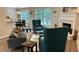 Comfortable living room with fireplace, stylish furnishings, and ample natural light at 3066 Gem Creek Rd, Buford, GA 30519