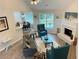 Inviting living room featuring a fireplace, plush seating, and wood floors at 3066 Gem Creek Rd, Buford, GA 30519