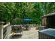Inviting outdoor deck with comfortable seating and lush wooded view at 40 Legend Creek Chase, Douglasville, GA 30134