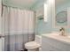 Bathroom with a shower and tub combination, sink, toilet, and decorative elements at 40 Legend Creek Chase, Douglasville, GA 30134