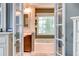 Bright bathroom featuring a soaking tub under a window and elegant white vanity with lots of storage at 40 Legend Creek Chase, Douglasville, GA 30134