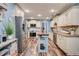 Charming kitchen with stainless steel appliances, island, and custom cabinets at 40 Legend Creek Chase, Douglasville, GA 30134