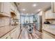 Open kitchen featuring stainless steel appliances, island, and tile backsplash at 40 Legend Creek Chase, Douglasville, GA 30134