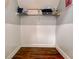 Efficient storage space with shelving and wood flooring, ideal for organization at 40 Legend Creek Chase, Douglasville, GA 30134