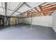 This is an unfinished basement with painted floor and exposed ceiling at 2189 Spear Point Dr, Marietta, GA 30062