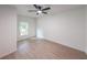 This is a bedroom featuring hardwood floors, white walls and a ceiling fan at 2189 Spear Point Dr, Marietta, GA 30062