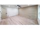 Bright bedroom featuring a decorative wall and hardwood floors, bathed in natural light at 2189 Spear Point Dr, Marietta, GA 30062